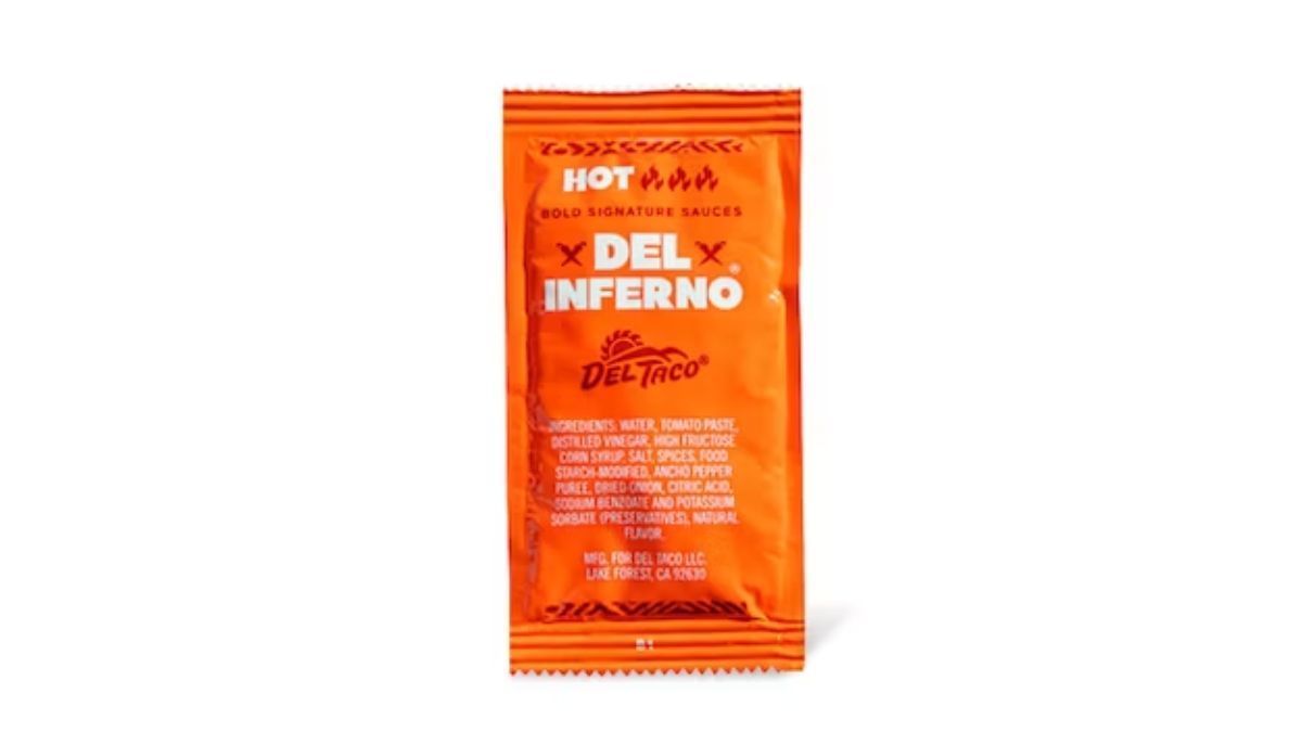 A Packet of Del Taco Del Inferno Sauce on White Background