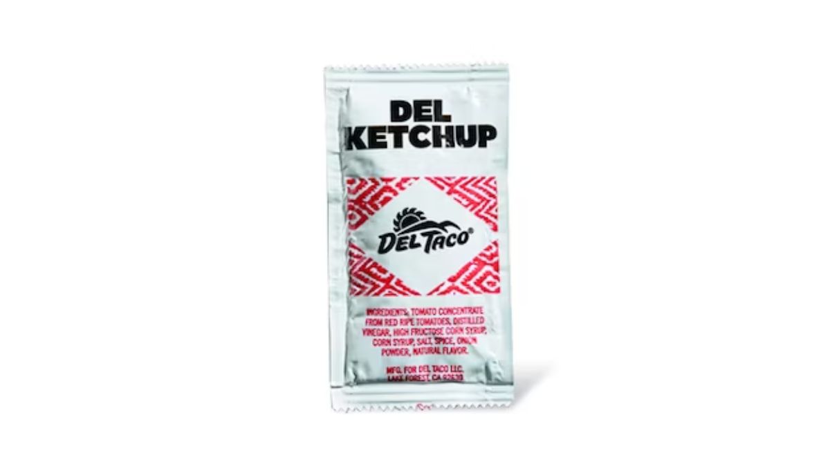A Packet of Del Taco Del Ketchup Sauce on White Background