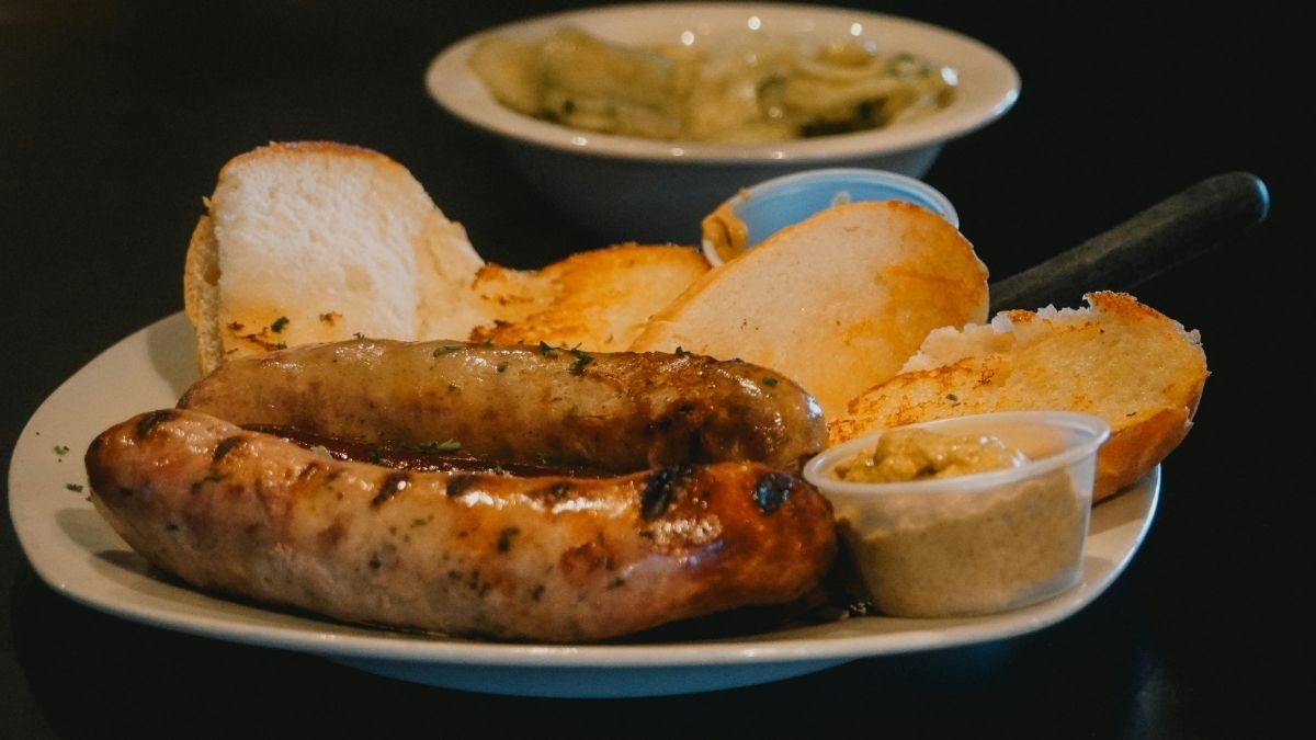 Bratwurst With Mustard and a Bread Roll