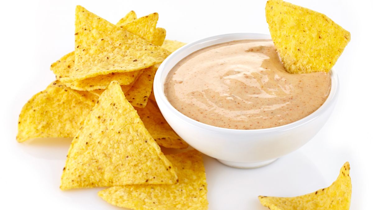 Panera Signature Sauce in a white bowl, served with Doritos Tortilla Chips