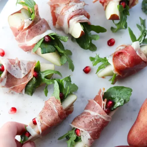 Prosciutto Wrapped Pears and arugula