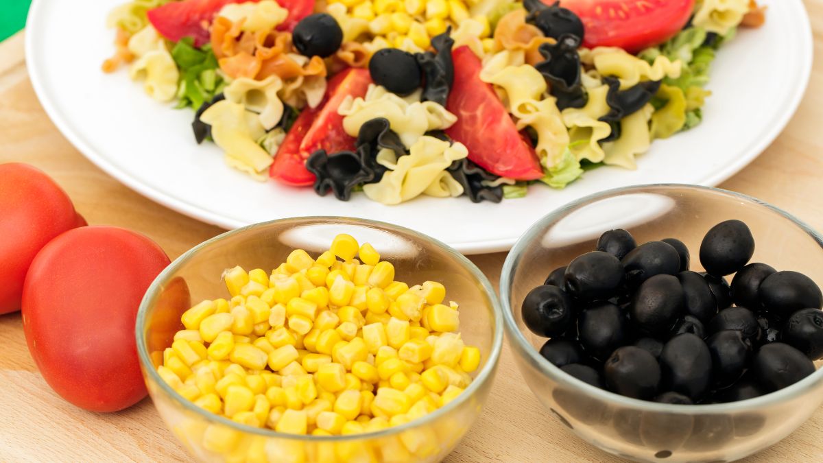 Add corn, olives and tomatoes to Betty Crocker Pasta Salad