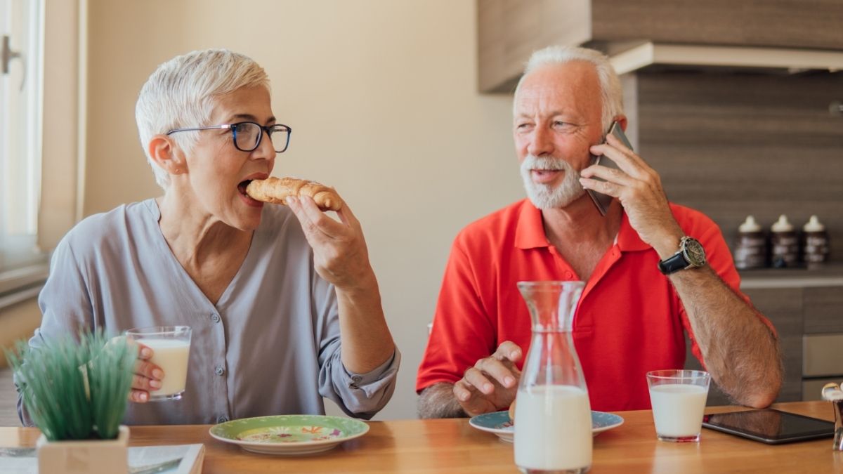 older couple eating breakfast