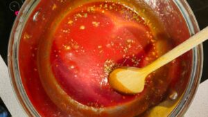 pour the tomato puree in
