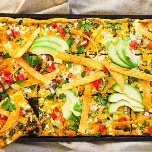 sheet pan mexican frittata with piece being removed