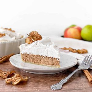 slice of cinnamon pie with apple cider meringue