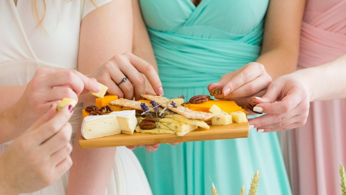women eating cheese